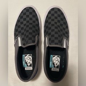 EUC Slip-on checkered Vans. Size 9.5 Men/11 Women
